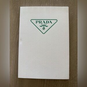 Prada Cream magazine with Green Logo
